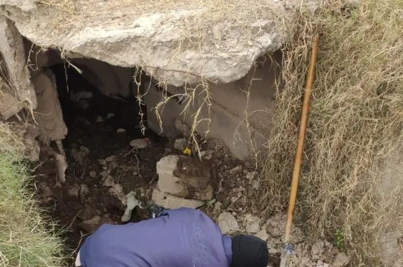 Trabajos de saneamiento y colocación de hormigón en desagüe pluvial urbano